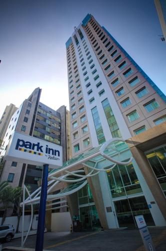 a tall building with a park inn sign in front of it at Park Inn by Radisson Berrini in Sao Paulo