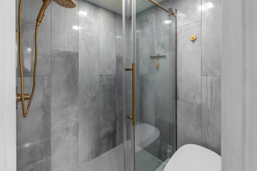 a bathroom with a glass shower with a toilet at Crestwood 1211 Standard Studio Loft in Snowmass Village