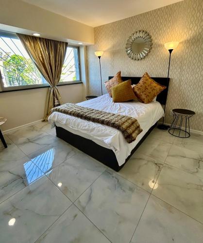 Katil atau katil-katil dalam bilik di 104 Sea Point Retreat