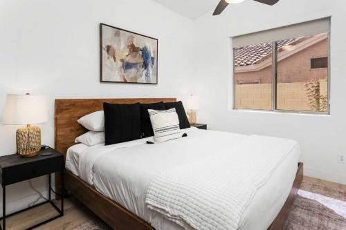 En eller flere senge i et værelse på Tailfeather