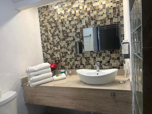 Phòng tắm tại Cancun Plaza Condo Mexico