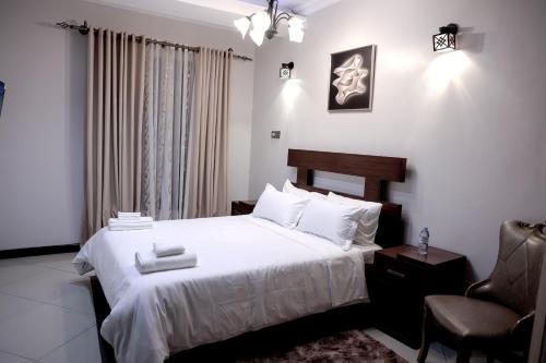 The Vista Residenceにあるベッド