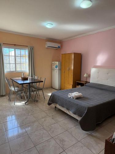 Cama o camas de una habitación en El amanecer de Colon