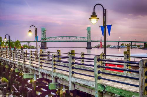 a bridge over the water with street lights at Water Street Condos Unit 310 in Wilmington