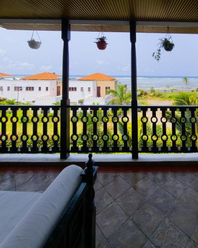 a balcony with a view of the ocean at Hayce Residence Ocean View Apartment in Kilifi
