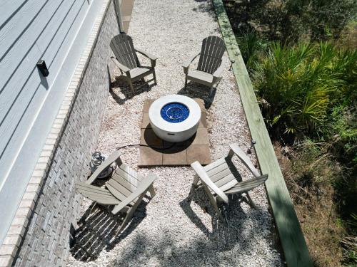 an overhead view of a patio with two chairs and a table at Endless Summer in Gulf Shores
