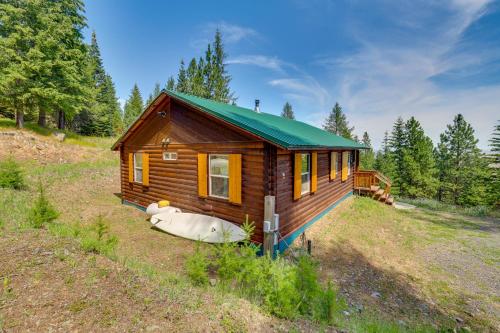 a small cabin in the middle of a field at Pet-Friendly Cabin on 10 Acres in Joseph Private! in Joseph
