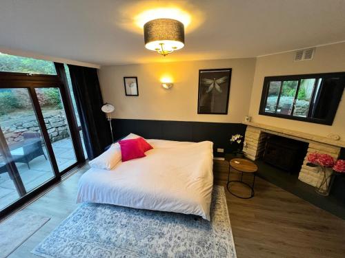 En eller flere senge i et værelse på Countryside Annexe