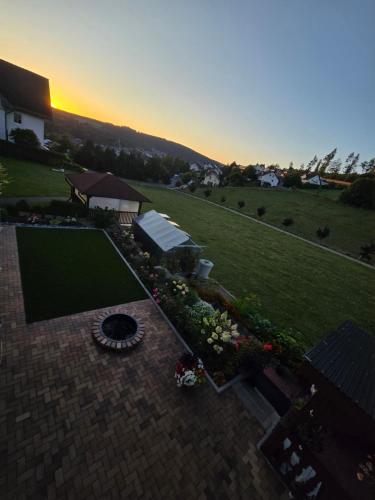 an aerial view of a backyard with a garden at Apartment Bergblick Bad Berleburg in Bad Berleburg
