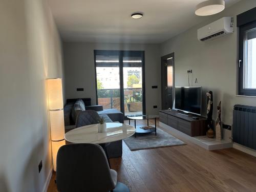 TV a/nebo společenská místnost v ubytování Elmora Residence Vračar Južni Bulevar