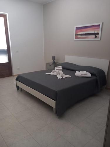 Cama o camas de una habitación en Il Rifugio del Salento