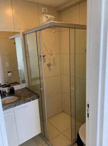 a bathroom with a shower and a sink at Flats Mobiliados Zona Norte, Casa Forte e Recife in Recife