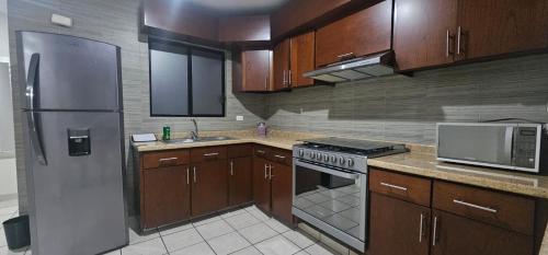 Η κουζίνα ή μικρή κουζίνα στο Departamento completo en Las Quintas Culiacan