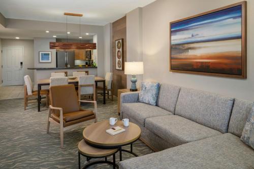 a living room with a couch and a table at The Westin Kierland Villas, Scottsdale in Scottsdale