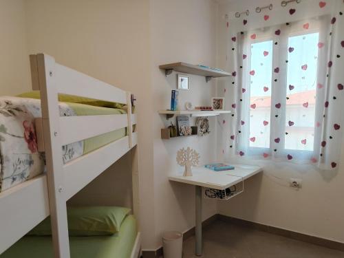 Postel nebo postele na pokoji v ubytování Casa del Minatore