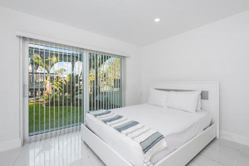 Postel nebo postele na pokoji v ubytování Fort Lauderdale Water Front Oasis