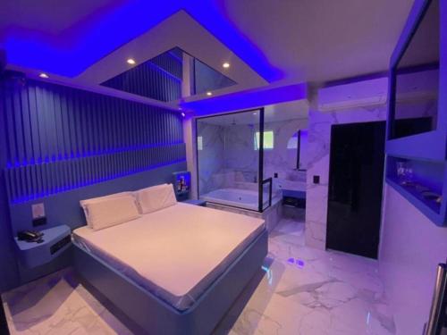 Ein Bett oder Betten in einem Zimmer der Unterkunft Vem Para o - COQUEIROS