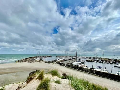 a marina with boats parked in the water at 6 person holiday home in Hovborg in Hovborg