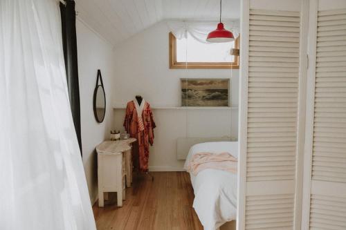 Cama o camas de una habitación en Hartwood Farm in the Huon Valley