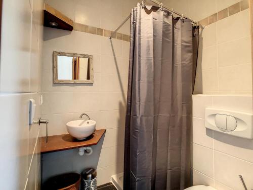 a bathroom with a shower and a sink at Oleandre in Cassagnolles