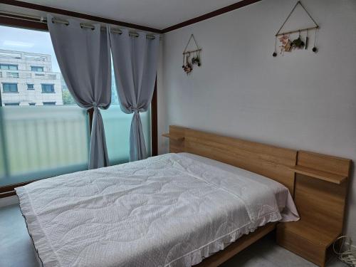 Postel nebo postele na pokoji v ubytování Stay SPC