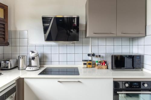 Una cocina o cocineta en Appartement Jade