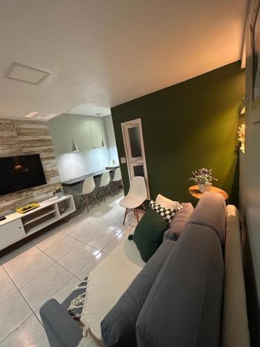 Televisyen dan/atau pusat hiburan di Flat Winterville Residence Gravatá