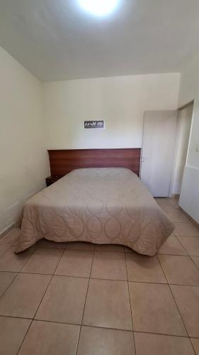 a bedroom with a large bed in a room at Umbrella 2 in La Rioja