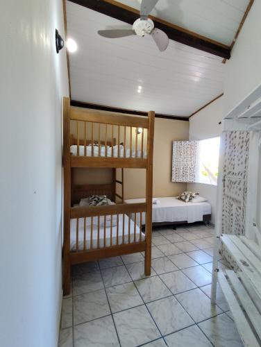 Ένα ή περισσότερα κρεβάτια σε δωμάτιο στο Ray Sol Hostel e Pousada