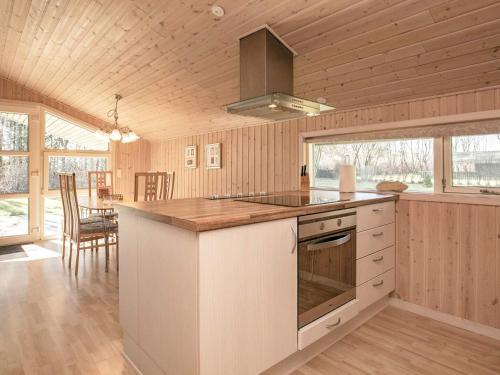 a kitchen with a stove and a counter top at 6 person holiday home in Fjerritslev-By Traum in Fjerritslev
