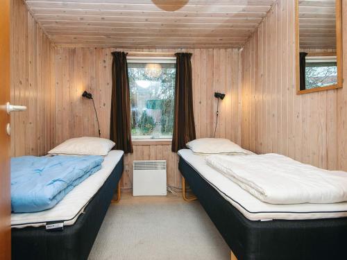 Ένα ή περισσότερα κρεβάτια σε δωμάτιο στο 6 person holiday home in Glesborg-By Traum