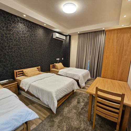 Postel nebo postele na pokoji v ubytování Modern Hotel-Style Apartment