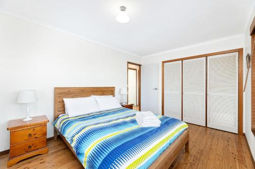 Ένα ή περισσότερα κρεβάτια σε δωμάτιο στο 27 Harrison Street Dalmeny