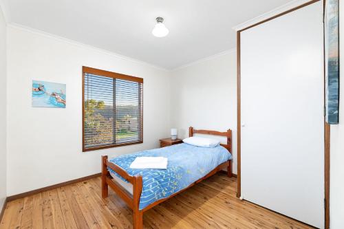 Ένα ή περισσότερα κρεβάτια σε δωμάτιο στο 27 Harrison Street Dalmeny