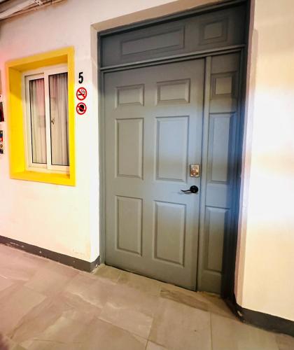 a door that is next to a building at Hotel y Arte Antigua by Amazing Guatemala Travel in Antigua Guatemala