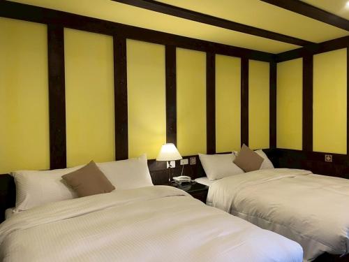 Katil atau katil-katil dalam bilik di Vanse B&B