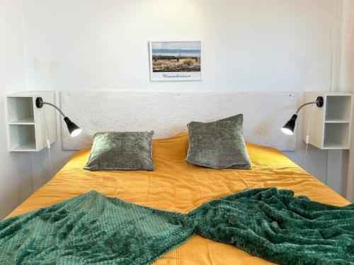 Ένα ή περισσότερα κρεβάτια σε δωμάτιο στο 4 star holiday home in LAHOLM