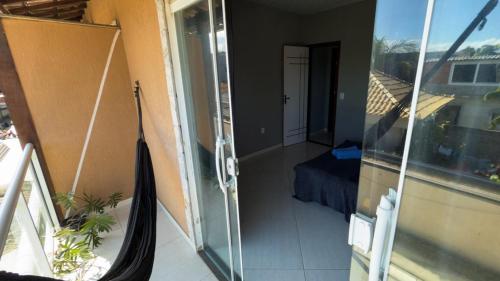 Balkoni atau teres di House in Itaúna, 4-minute walk to the beach