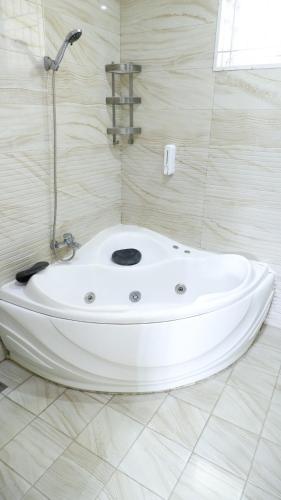 Ένα μπάνιο στο Diyar Villas Puncak H1/6