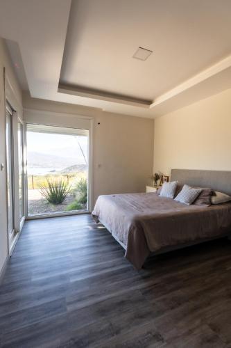 Katil atau katil-katil dalam bilik di Casa Cactus - Una Experiencia Unica - Potrerillos Mendoza