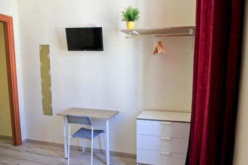 TV a/nebo společenská místnost v ubytování Hotel Elandra