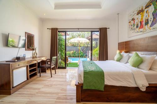 Postel nebo postele na pokoji v ubytování Gracia Bali Villas & Apartment Managed by Manara