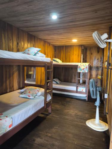 Ein Bett oder Betten in einem Zimmer der Unterkunft Hostal velero relax