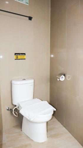 Salle de bains dans l'établissement Pakons Prime Hotel