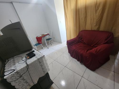 Ruang duduk di Apartamento no Centro