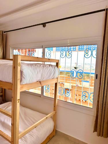 Postel nebo postele na pokoji v ubytování shared room , balance surf camp , feel home , let's create memories together
