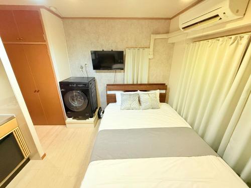 Katil atau katil-katil dalam bilik di P-Yamanote Line shinjuku 高田馬場 5mins walk Hostel! 高速Wi-fi! Waseda