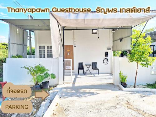 a view of the front of a house with awning at ธัญพร เกสต์เฮาส์ in Tak