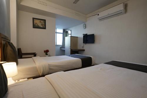 hotelshantisadanにあるベッド