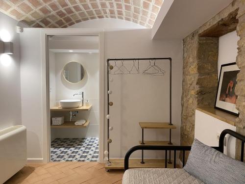 a bathroom with a shower and a sink at Charming Home Near Vulpellac in Vulpellac